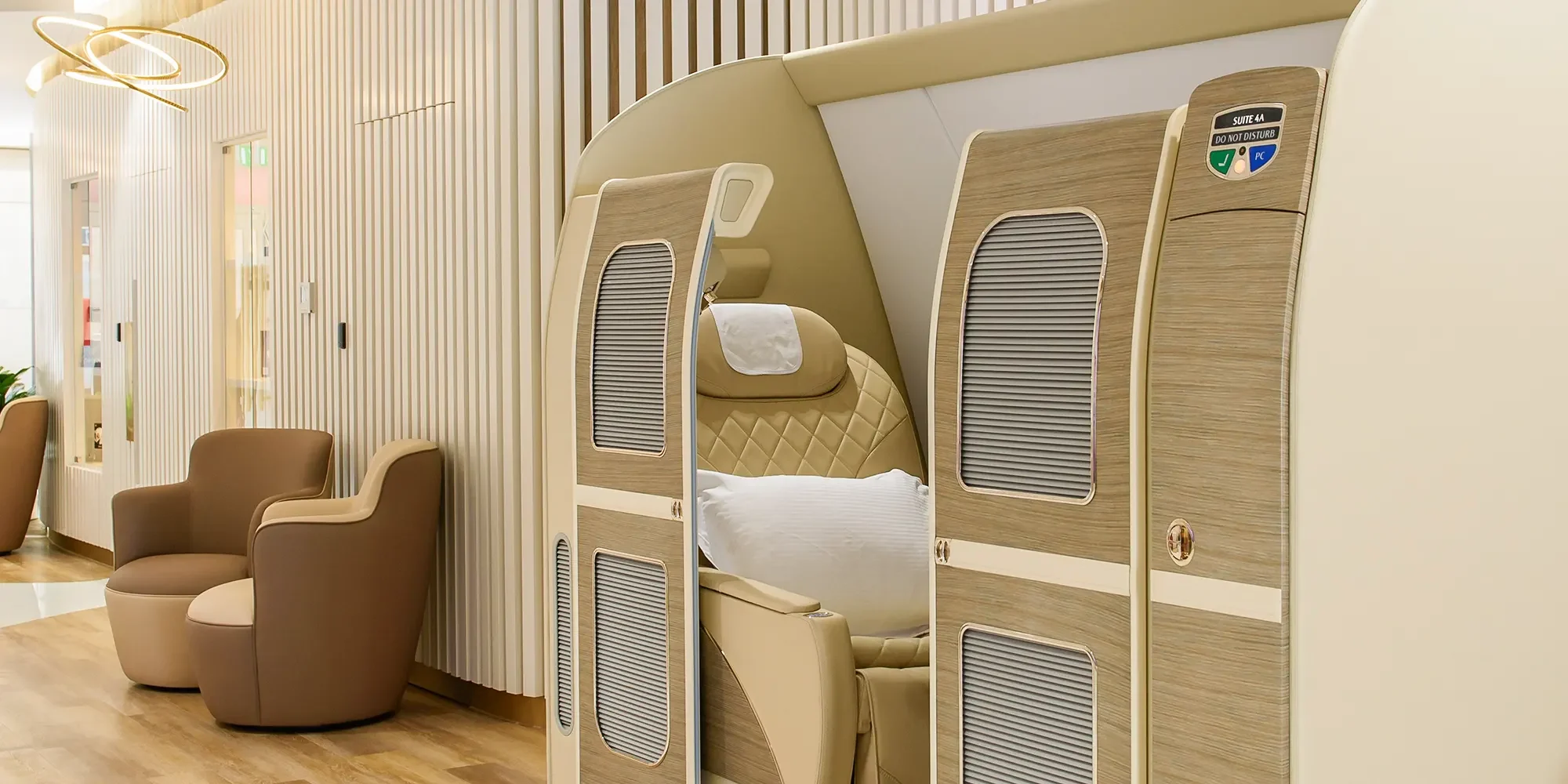First Class Private Suite Space with Lounge chairs in Emirates Travel Shop, London