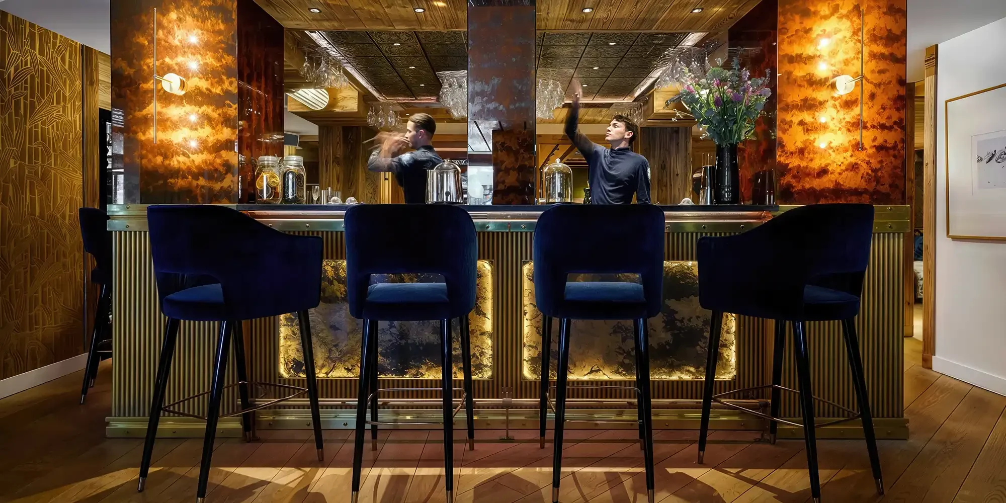 Hotel La Sivoliere France, Bar Counter with custom bar chairs made of velvet and wooden base.
